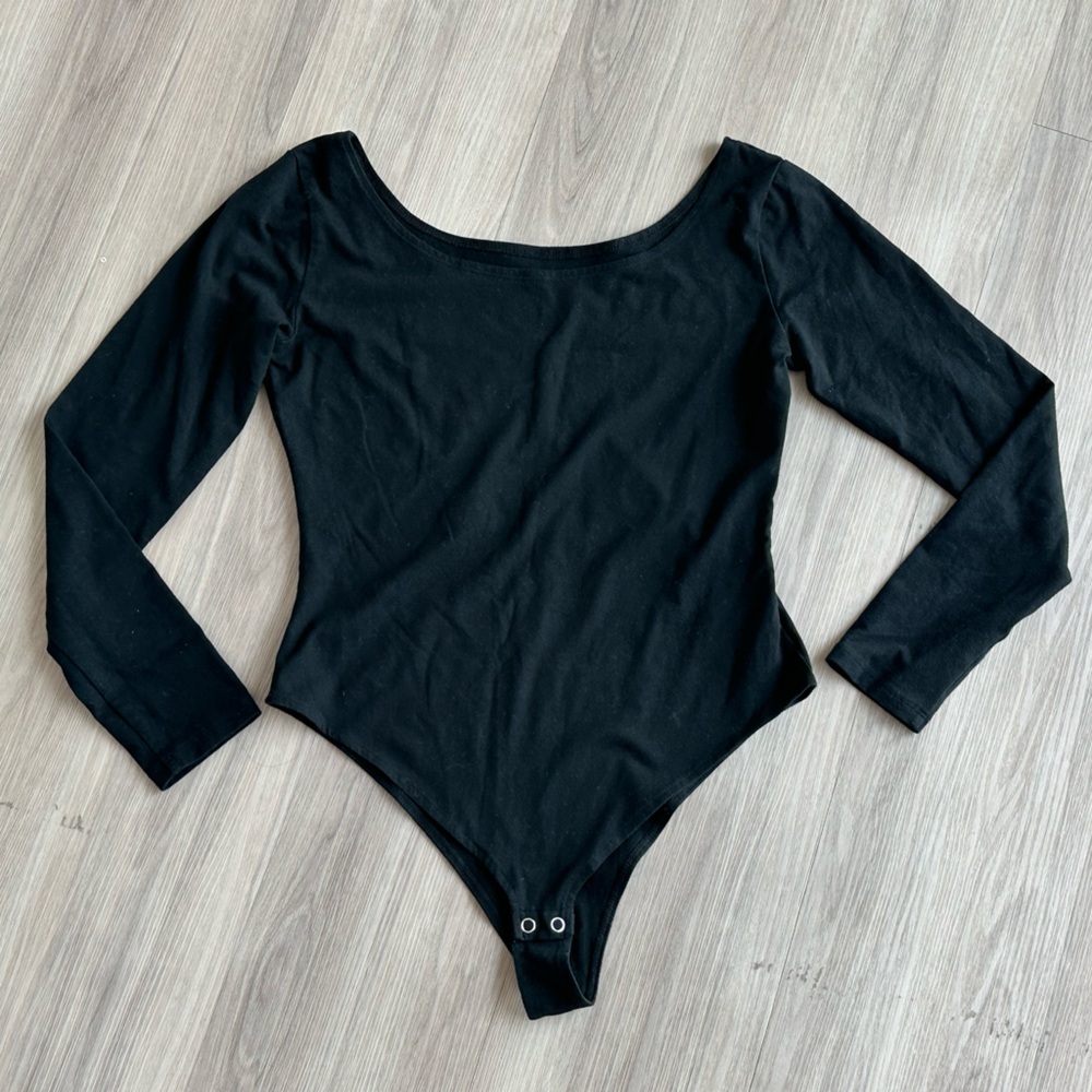A New Day black bodysuit